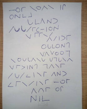 Poem written in Braille precursor Moon Type, by Volodymyr Bilyk, Ukraine. See below for transcript.